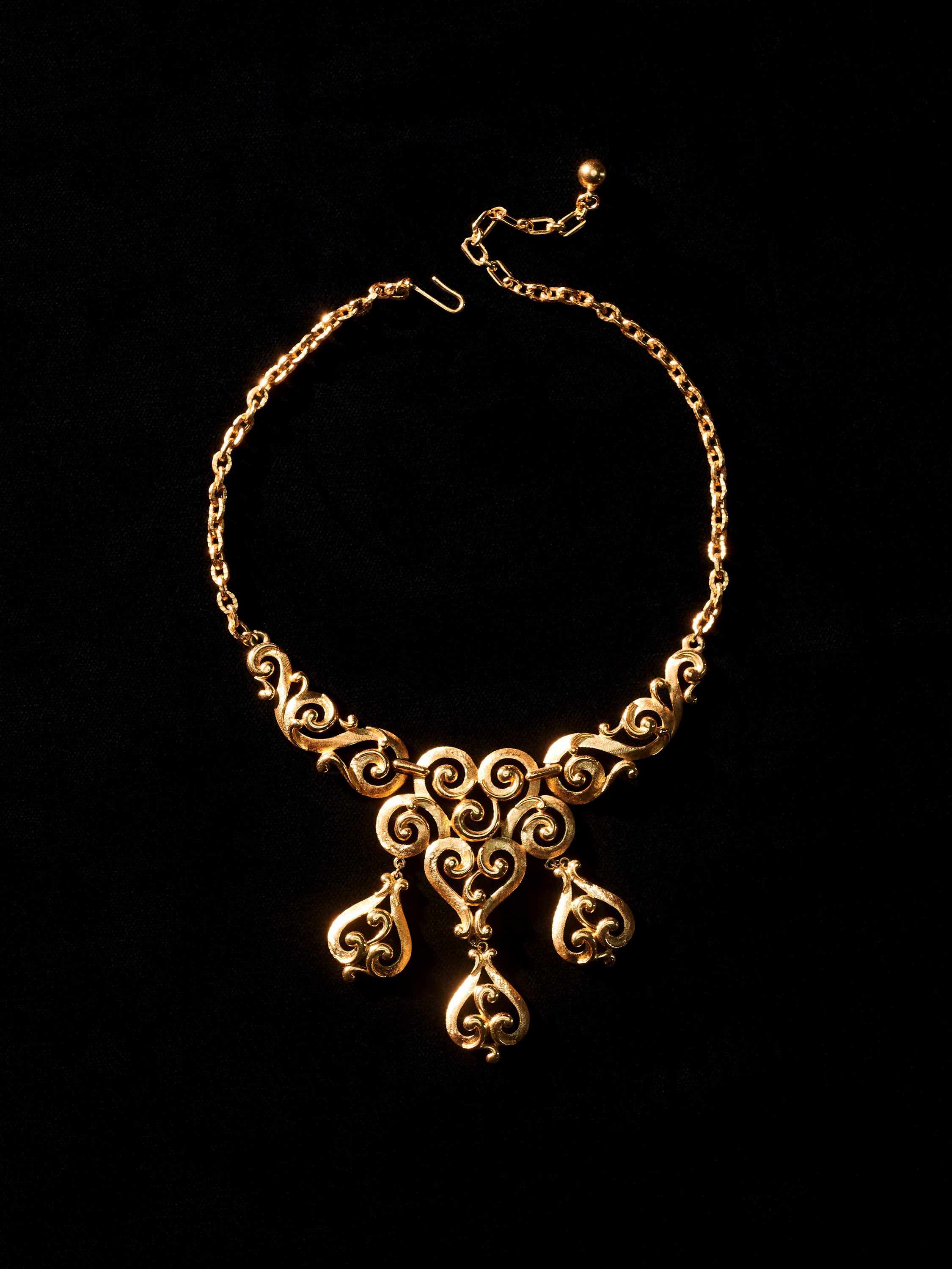 Gold Tone Swirl Statement Necklace