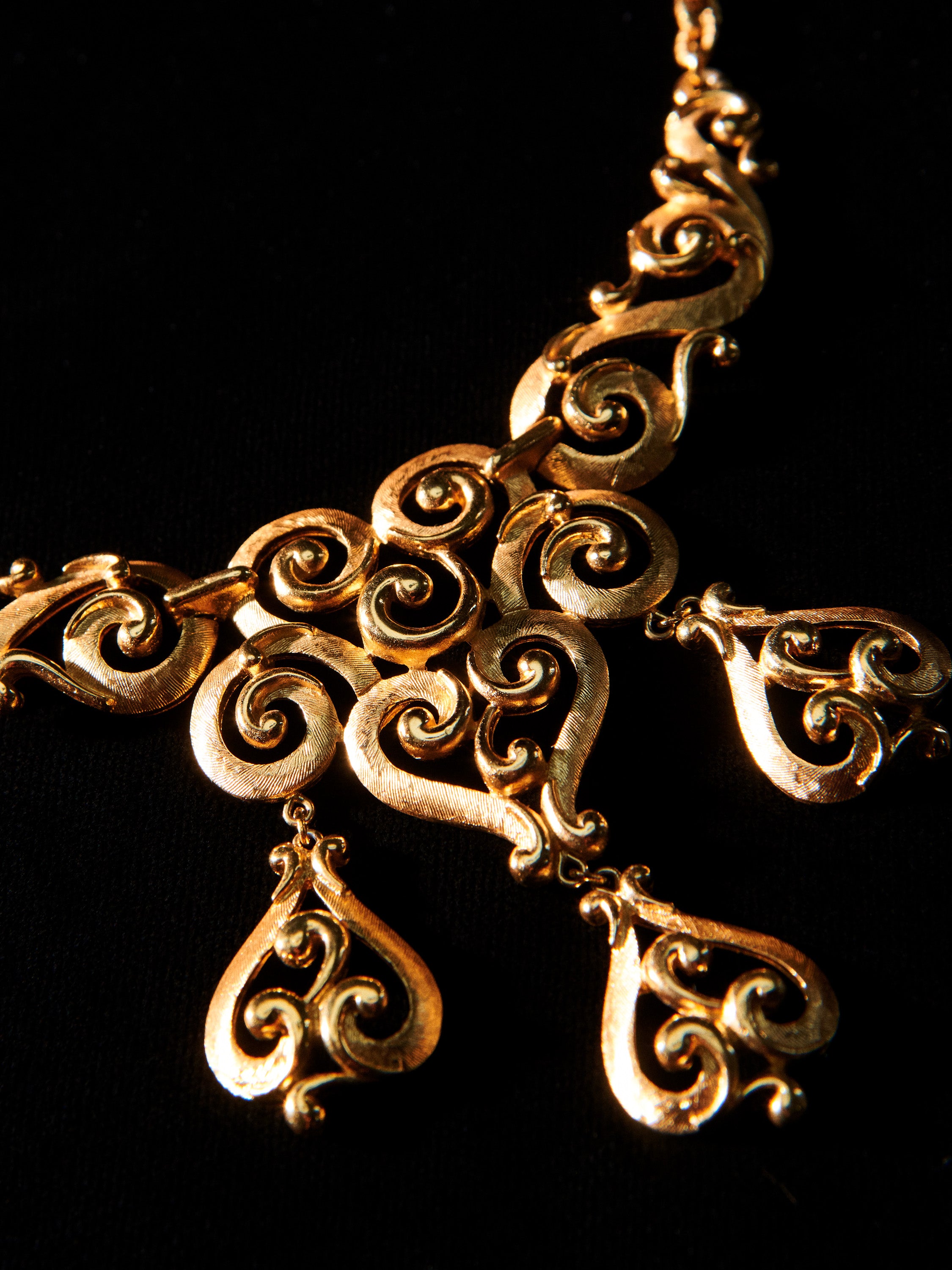 Gold Tone Swirl Statement Necklace