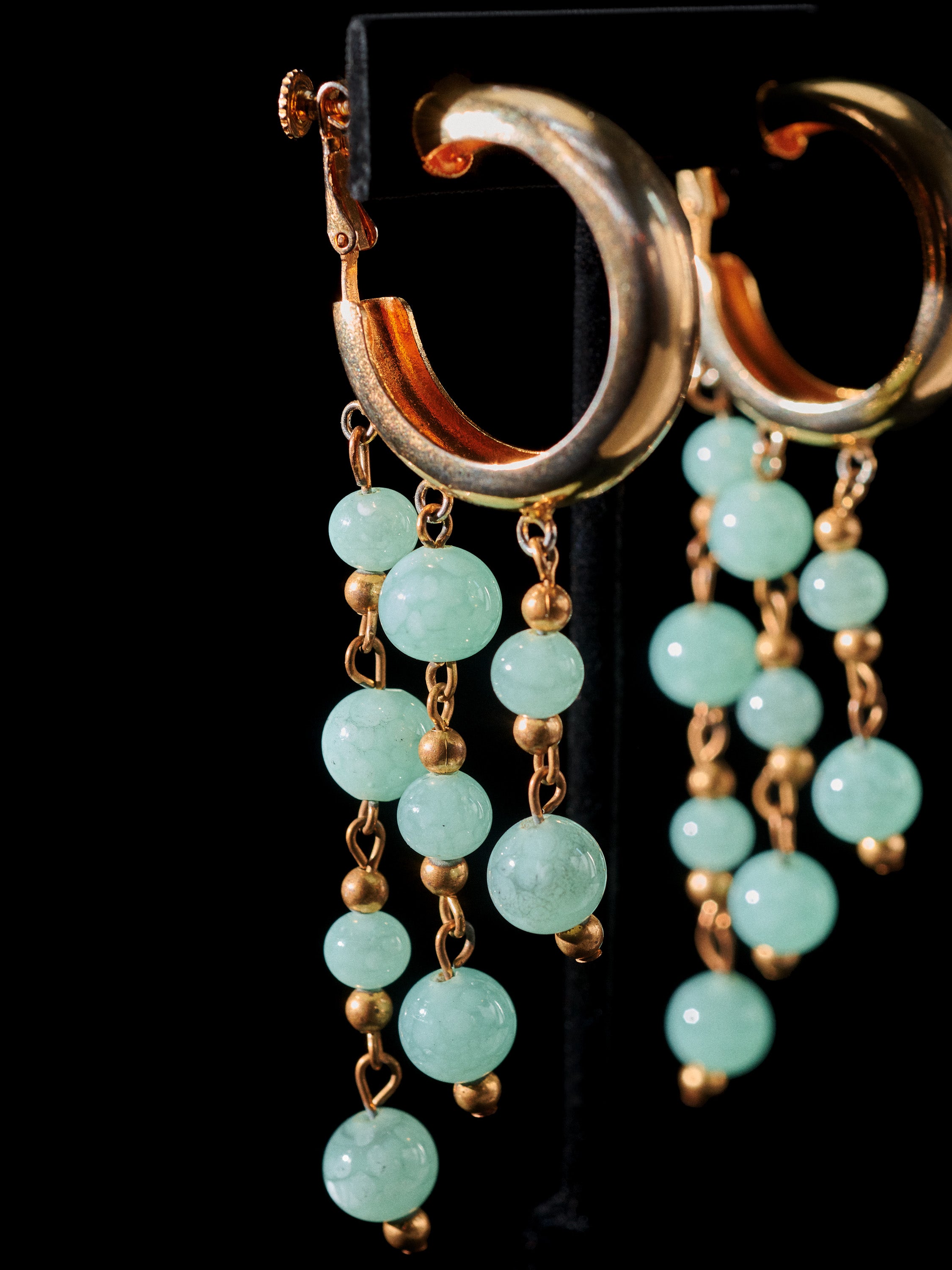 Gold Tone Cascading Green Stone Earrings